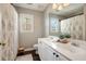 Bright bathroom featuring a double vanity, natural light, and stylish shower curtain at 2759 Wyndcliff Way, Marietta, GA 30066