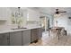 Bright kitchen featuring stainless steel appliances, tile backsplash, and view to screened porch at 2759 Wyndcliff Way, Marietta, GA 30066