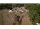 Sprawling country estate aerial view showing the house, barn, fencing and acreage at 5570 Bold Springs Rd, Dacula, GA 30019