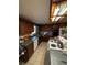 A functional kitchen featuring wooden cabinets, modern appliances, and neutral countertops at 5570 Bold Springs Rd, Dacula, GA 30019