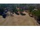 Open plot of land with potential for development, surrounded by lush trees at 5570 Bold Springs Rd, Dacula, GA 30019