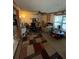 Carpeted living room features comfortable seating and decor at 5570 Bold Springs Rd, Dacula, GA 30019