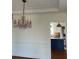 Formal dining area showcasing hardwood floors and adjacent to the kitchen at 509 Arnold Road, Lawrenceville, GA 30044