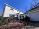 Exterior angle view of the home, featuring a partial view of the 2-car garage at 509 Arnold Rd, Lawrenceville, GA 30044