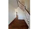 Inviting foyer with hardwood floors, staircase, and decorative chandelier at 509 Arnold Rd, Lawrenceville, GA 30044