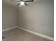 Cozy bedroom with ceiling fan and neutral walls at 5157 West St, Covington, GA 30014