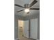 Bedroom with ceiling fan, and access to a full bath at 5157 West St, Covington, GA 30014