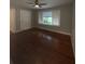 Living room with hardwood floors and natural light at 5157 West St, Covington, GA 30014