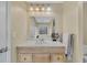 Bright bathroom featuring a marble countertop vanity with drawers and recessed lighting at 5833 Westerling Pl, Powder Springs, GA 30127