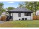 An outdoor living space with a fire pit and a well-maintained backyard, ideal for relaxation and enjoying the outdoors at 645 Cumberland Rd, Atlanta, GA 30306