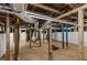 Unfinished basement featuring exposed beams and ductwork and a concrete floor at 645 Cumberland Rd, Atlanta, GA 30306