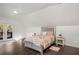 Bright bedroom features a walk out balcony and a luxurious silver bed at 645 Cumberland Rd, Atlanta, GA 30306