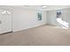 Finished basement with carpet flooring and natural light at 773 Cone Rd, Forest Park, GA 30297