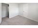 A bedroom with carpet flooring and neutral colored walls at 773 Cone Rd, Forest Park, GA 30297