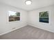 Neutral bedroom with large windows and carpeting at 773 Cone Rd, Forest Park, GA 30297