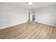 Spacious bedroom with light-colored walls and wood-look flooring at 773 Cone Rd, Forest Park, GA 30297