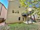 Multi-story home exterior featuring a backyard deck and well-maintained lawn at 91 Reynoldston Ct, Suwanee, GA 30024