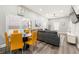 Open concept living area with dining table and chairs, featuring a hardwood floors at 1863 Williams Ave, Atlanta, GA 30344