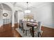 Bright dining room with coffered ceilings, a pendant light, and easy access to other rooms at 2268 Austin Common Way, Dacula, GA 30019