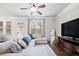 Comfortable living room with sectional sofa, hardwood floors and lots of natural light at 2268 Austin Common Way, Dacula, GA 30019