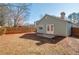 Home exterior featuring a fenced backyard and outdoor patio at 4676 Cedar Park Trl, Stone Mountain, GA 30083