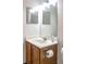 Cozy bathroom featuring a vanity and a mirror with attractive lighting at 4676 Cedar Park Trl, Stone Mountain, GA 30083