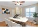 Bright dining room features wood floors, neutral paint and a window at 4676 Cedar Park Trl, Stone Mountain, GA 30083