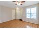 Inviting Living room with wood floors, neutral walls and a bright window at 4676 Cedar Park Trl, Stone Mountain, GA 30083