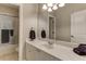 Bathroom featuring a single sink vanity and a tub shower at 5964 Reddington Way, Sandy Springs, GA 30328