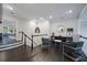 Upstairs foyer with hardwood flooring and decorative lighting at 5964 Reddington Way, Sandy Springs, GA 30328