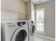 Laundry room with Samsung washer and dryer at 5964 Reddington Way, Sandy Springs, GA 30328