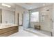 Beautiful shower with tiled walls and rainfall shower head at 5964 Reddington Way, Sandy Springs, GA 30328