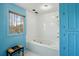 A bathroom featuring a soaking tub and tile surround at 1605 Saint Tropez Way, Atlanta, GA 30350