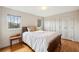 Bedroom with neutral walls and a comfortable bed at 1605 Saint Tropez Way, Atlanta, GA 30350
