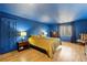 Comfortable bedroom featuring hardwood floors and a large window at 1605 Saint Tropez Way, Atlanta, GA 30350