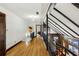 Second floor hallway with hardwood floors and exposed beams at 1605 Saint Tropez Way, Atlanta, GA 30350