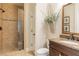 Bathroom featuring glass enclosed shower, tile floors, and granite topped vanity at 3631 Habersham Nw Rd, Atlanta, GA 30305