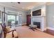 Spacious bedroom with a fireplace and access to a covered balcony at 3631 Habersham Nw Rd, Atlanta, GA 30305