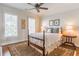 Bedroom featuring a king bed, side tables and shudders at 3631 Habersham Nw Rd, Atlanta, GA 30305