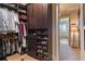 Organized walk-in closet with custom built-ins for clothes, shoes, and accessories at 3631 Habersham Nw Rd, Atlanta, GA 30305