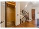 Grand foyer with a staircase, elevator, and hardwood floors at 3631 Habersham Nw Rd, Atlanta, GA 30305