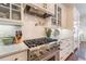 Gourmet kitchen with gas range, stainless steel appliances, and tile backsplash at 3631 Habersham Nw Rd, Atlanta, GA 30305