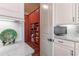Pantry in white kitchen featuring custom cabinets, counter space, and tile backsplash at 3631 Habersham Nw Rd, Atlanta, GA 30305