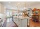 Large open kitchen with island, hardwood floors, and ample natural light at 3631 Habersham Nw Rd, Atlanta, GA 30305