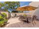 Outdoor patio featuring multiple seating areas and a large parasol at 3631 Habersham Nw Rd, Atlanta, GA 30305