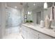 Elegant bathroom with marble countertop and glass-enclosed shower at 3630 Peachtree Ne Rd # 3401, Atlanta, GA 30326