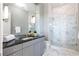 Elegant bathroom with marble shower and dual vanity at 3630 Peachtree Ne Rd # 3401, Atlanta, GA 30326