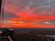 Stunning city view at sunrise with a beautiful red sky and scattered clouds at 3630 Peachtree Ne Rd # 3401, Atlanta, GA 30326