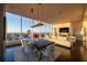Elegant dining area with stylish lighting and city views, adjacent to an open-concept living space at 3630 Peachtree Ne Rd # 3401, Atlanta, GA 30326