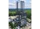 Modern high-rise condo with a beautiful glass exterior and green surroundings at 3630 Peachtree Ne Rd # 3401, Atlanta, GA 30326